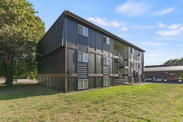 107 E Hattie Ave, Coeur D Alene, ID 83814 - view of property exterior featuring a yard