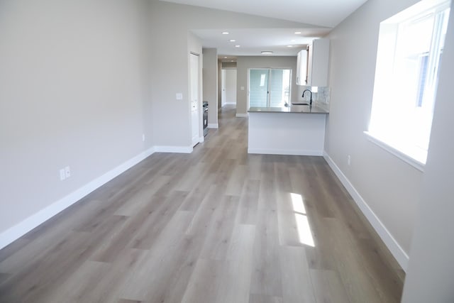 315 E I St, Deer Park, WA 99006 - unfurnished living room featuring light wood-type flooring and recessed lighting