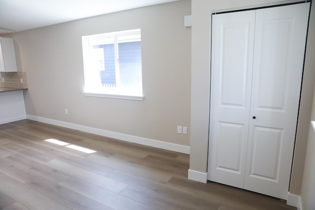 315 E I St, Deer Park, WA 99006 - unfurnished living room featuring wood finished floors and baseboards