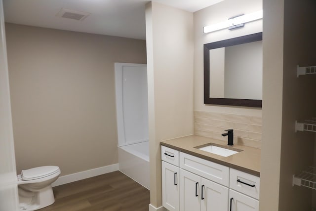 315 E I St, Deer Park, WA 99006 - full bathroom with backsplash, vanity, and wood finished floors