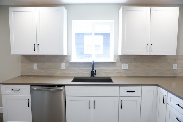315 E I St, Deer Park, WA 99006 - kitchen featuring dishwasher, white cabinetry, and tasteful backsplash
