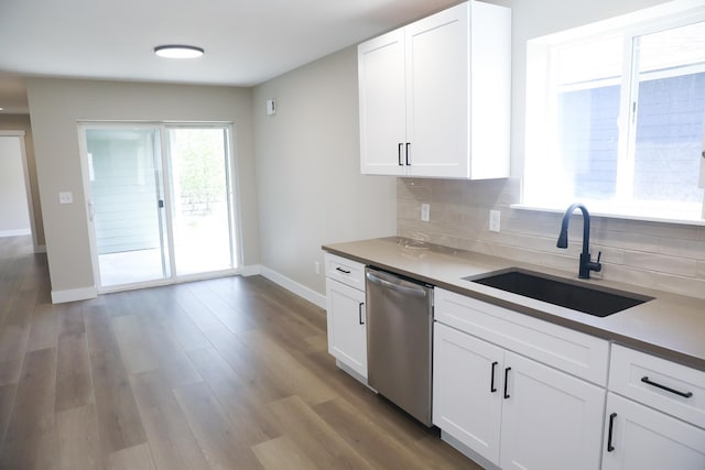 315 E I St, Deer Park, WA 99006 - kitchen with dishwasher, backsplash, wood finished floors, and white cabinets