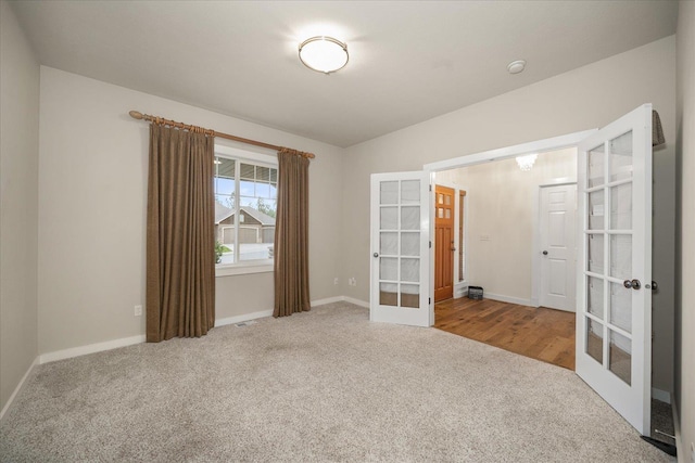404 W Trail Ridge Ct, Spokane, WA 99224 - carpeted spare room with french doors and a smoke detector