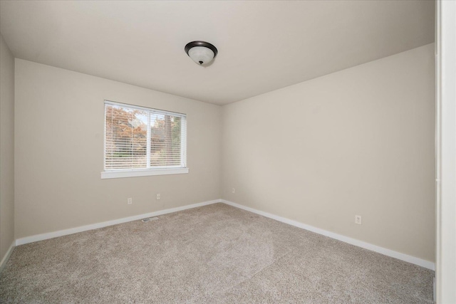 404 W Trail Ridge Ct, Spokane, WA 99224 - carpeted spare room featuring baseboards