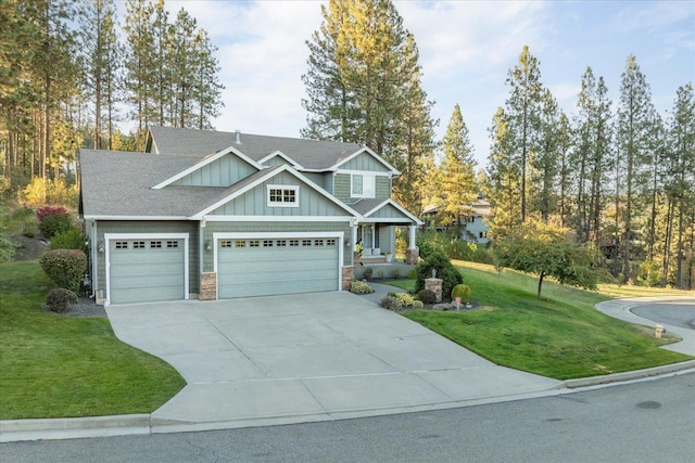 404 W Trail Ridge Ct, Spokane, WA 99224 - craftsman-style house featuring board and batten siding, a front lawn, driveway, a garage, and stone siding