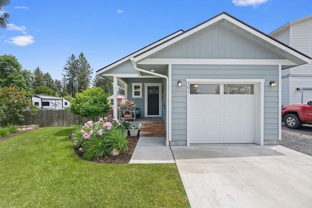 301 S Forest Ave, Deer Park, WA 99006 - view of front of property featuring a porch, a garage, and driveway