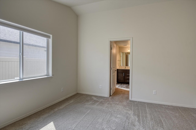 8115 W 57th Ave, Spokane, WA 99224 - unfurnished bedroom with carpet floors and lofted ceiling