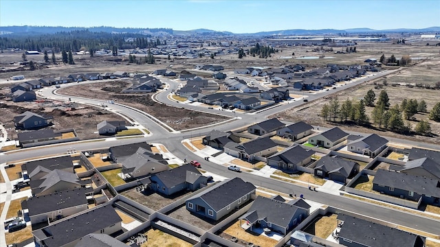 8115 W 57th Ave, Spokane, WA 99224 - aerial view of residential area featuring a mountain backdrop