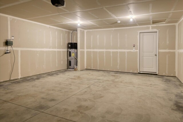 8115 W 57th Ave, Spokane, WA 99224 - garage featuring water heater and a garage door opener