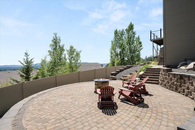 7620 E Ruby Ln, Spokane, WA 99212 - view of patio / terrace with stairway and a fire pit