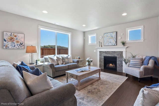 18115 E Barclay Ct Unit 2/3Stoneridge, Encore, Spokane Valley, WA 99016 - living room featuring a fireplace, dark wood-style floors, and recessed lighting