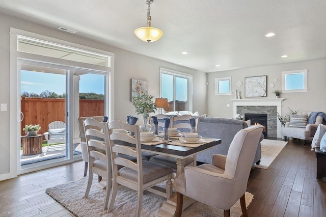18115 E Barclay Ct Unit 2/3Stoneridge, Encore, Spokane Valley, WA 99016 - dining room with hardwood / wood-style flooring, a fireplace, and recessed lighting