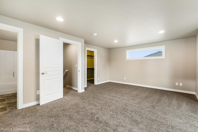 18115 E Barclay Ct Unit 2/3Stoneridge, Encore, Spokane Valley, WA 99016 - unfurnished bedroom with carpet flooring, a walk in closet, recessed lighting, and a closet