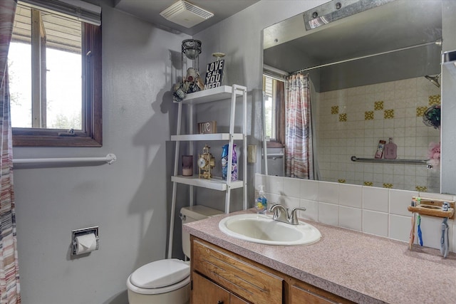 5022 W Garden Springs Ave Unit 5024W, Garden Springs, Spokane, WA 99224 - bathroom with vanity, a shower with curtain, and tasteful backsplash
