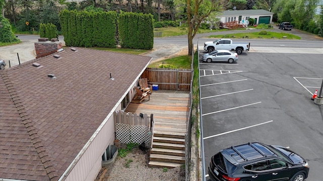 5022 W Garden Springs Ave Unit 5024W, Garden Springs, Spokane, WA 99224 - uncovered parking lot featuring view of wooded area
