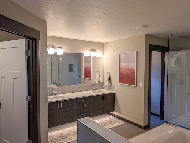 11614 E Rivercrest Dr, Spokane Valley, WA 99206 - full bathroom with a textured wall, a textured ceiling, double vanity, and a shower with door
