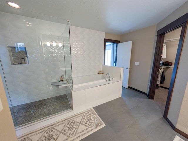11614 E Rivercrest Dr, Spokane Valley, WA 99206 - full bathroom with a bath, walk in shower, a spacious closet, tile patterned flooring, and recessed lighting