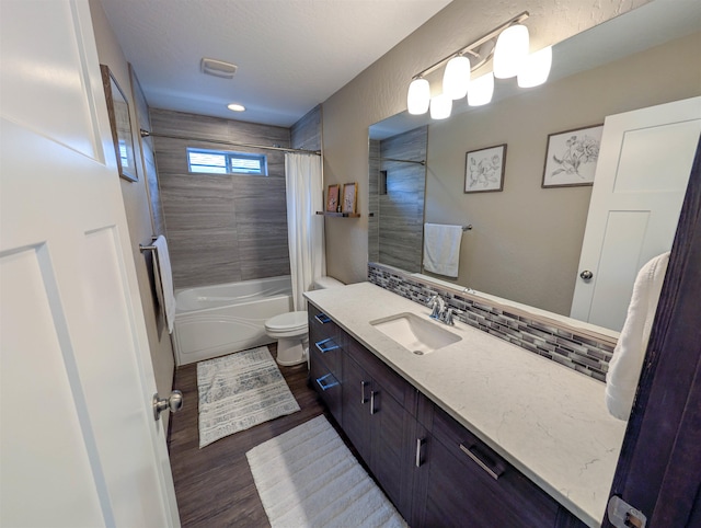 11614 E Rivercrest Dr, Spokane Valley, WA 99206 - bathroom with vanity, shower / tub combo, wood finished floors, and decorative backsplash