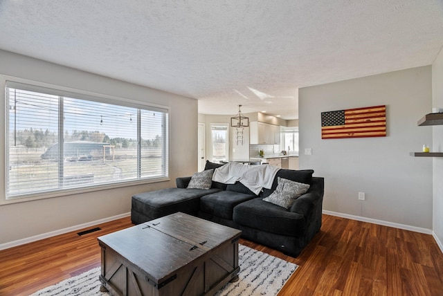 14706 N Mckinnon Ct, Mead, WA 99021 - living area with wood finished floors and a textured ceiling