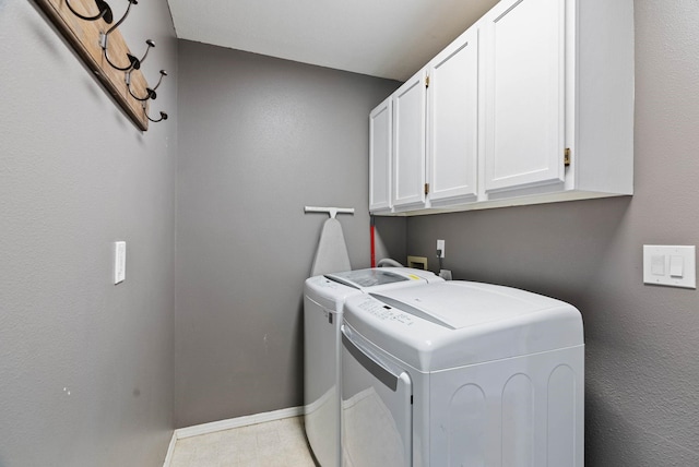 14706 N Mckinnon Ct, Mead, WA 99021 - laundry room with cabinet space and washing machine and clothes dryer