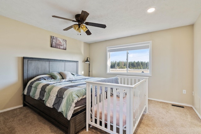 14706 N Mckinnon Ct, Mead, WA 99021 - bedroom with carpet floors, a ceiling fan, and recessed lighting