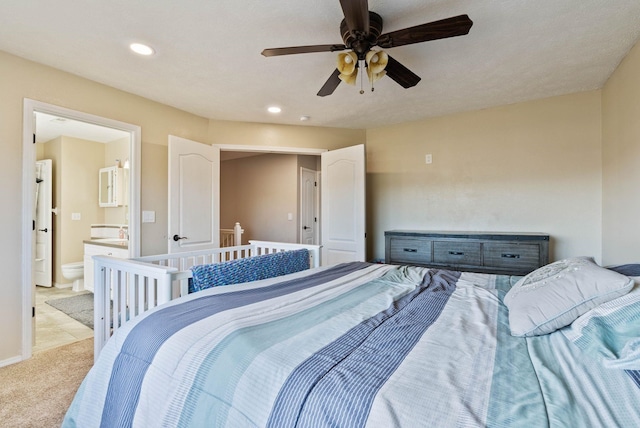 14706 N Mckinnon Ct, Mead, WA 99021 - carpeted bedroom with connected bathroom, recessed lighting, and a ceiling fan