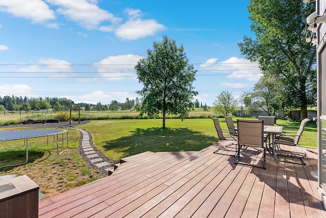 14706 N Mckinnon Ct, Mead, WA 99021 - wooden terrace featuring a trampoline and outdoor dining space