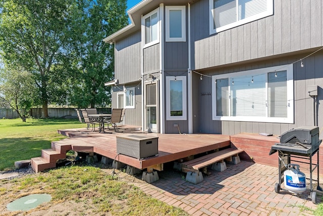 14706 N Mckinnon Ct, Mead, WA 99021 - wooden terrace with outdoor dining area and grilling area