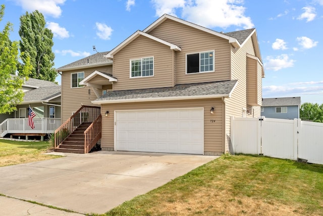 724 E Joshua Dr, Medical Lake, WA 99022 - view of front of property featuring a garage, roof with shingles, concrete driveway, and a gate