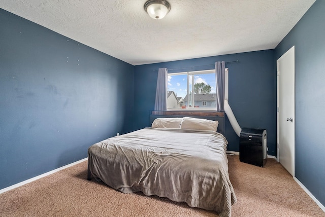 724 E Joshua Dr, Medical Lake, WA 99022 - carpeted bedroom featuring a textured ceiling and baseboards