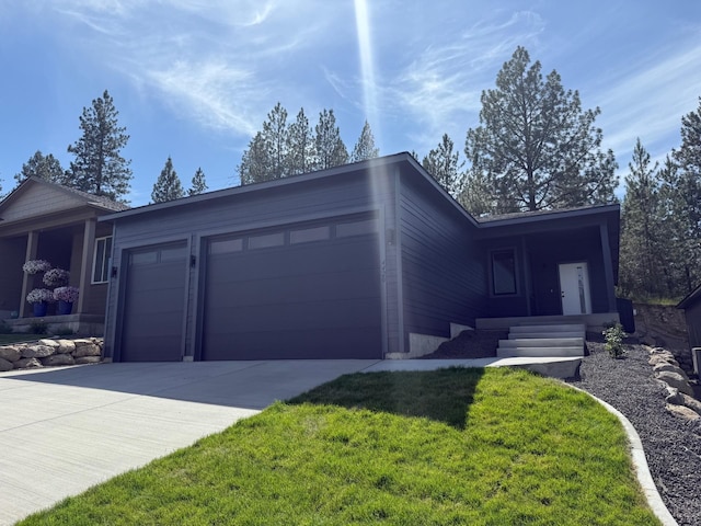 4420 S Willow Ln, Spokane, WA 99216 - ranch-style home featuring a garage, driveway, and a front yard