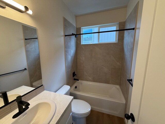 4420 S Willow Ln, Spokane, WA 99216 - bathroom with vanity, shower / bath combination, and wood finished floors