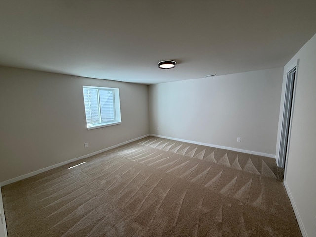 4420 S Willow Ln, Spokane, WA 99216 - spare room featuring carpet flooring and baseboards