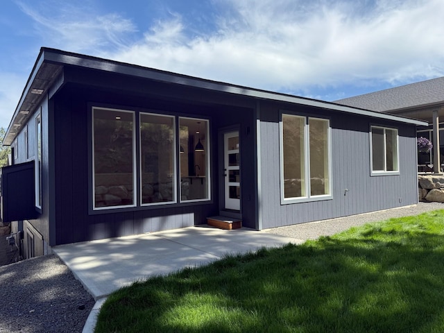 4420 S Willow Ln, Spokane, WA 99216 - rear view of house with a yard