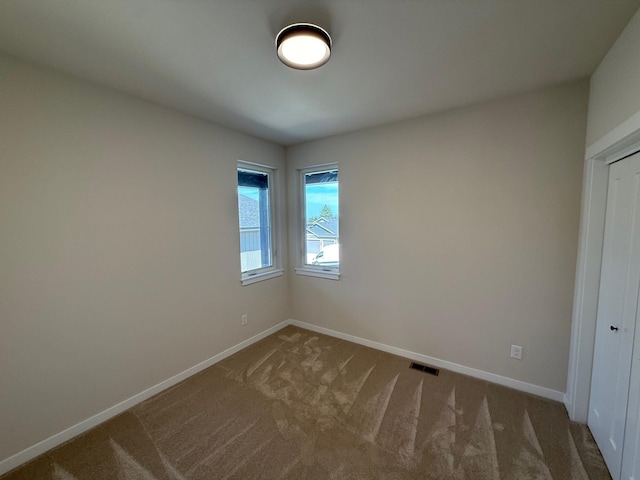 4420 S Willow Ln, Spokane, WA 99216 - unfurnished room with baseboards and carpet floors