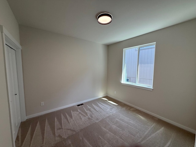 4420 S Willow Ln, Spokane, WA 99216 - unfurnished bedroom with carpet floors and a closet