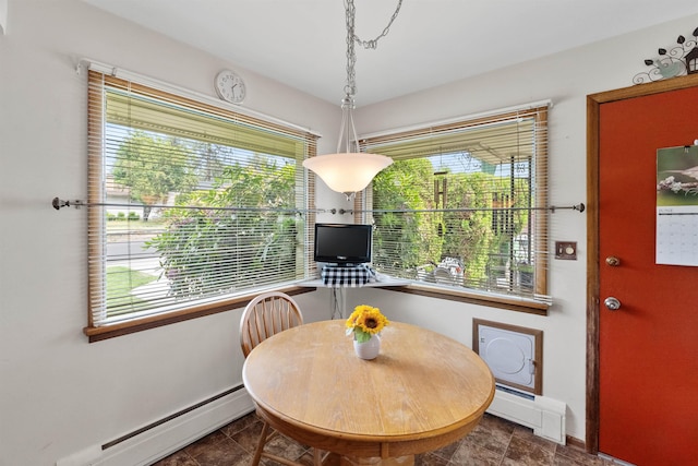 3205 W Hoffman Ave, Spokane, WA 99205 - dining room featuring a baseboard radiator and baseboard heating