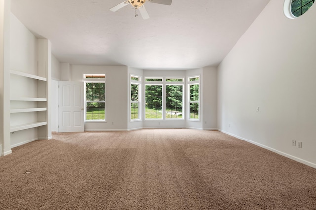 16417 N Napa Ln, Spokane, WA 99208 - empty room featuring carpet floors, ceiling fan, and built in features
