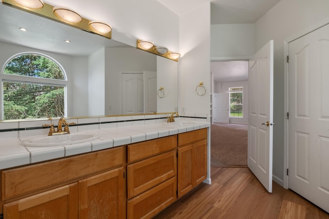 16417 N Napa Ln, Spokane, WA 99208 - full bath with double vanity, wood finished floors, and recessed lighting
