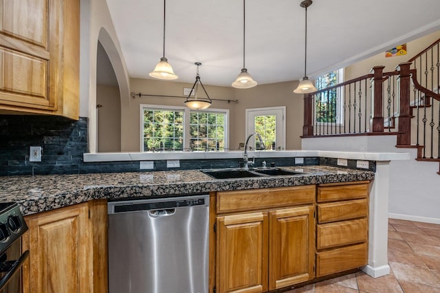 16417 N Napa Ln, Spokane, WA 99208 - kitchen featuring dishwasher, backsplash, plenty of natural light, and light tile patterned flooring
