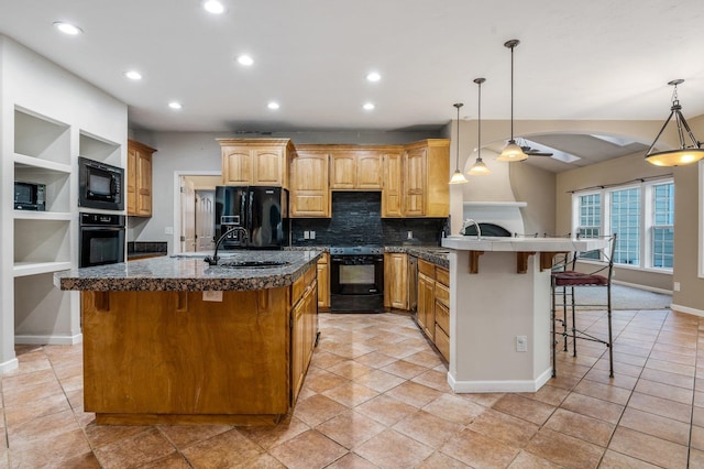 16417 N Napa Ln, Spokane, WA 99208 - kitchen featuring black appliances, a breakfast bar area, tasteful backsplash, ceiling fan, and recessed lighting