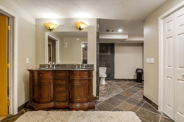 16417 N Napa Ln, Spokane, WA 99208 - full bathroom featuring double vanity and recessed lighting