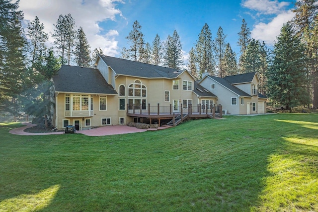 16417 N Napa Ln, Spokane, WA 99208 - back of property with a patio area, a lawn, and a wooden deck
