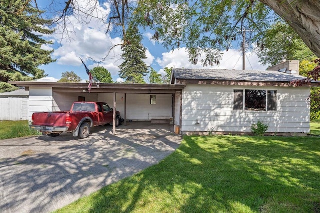2920 N Regal St, Spokane, WA 99207 - ranch-style house with concrete driveway, a carport, and a front lawn