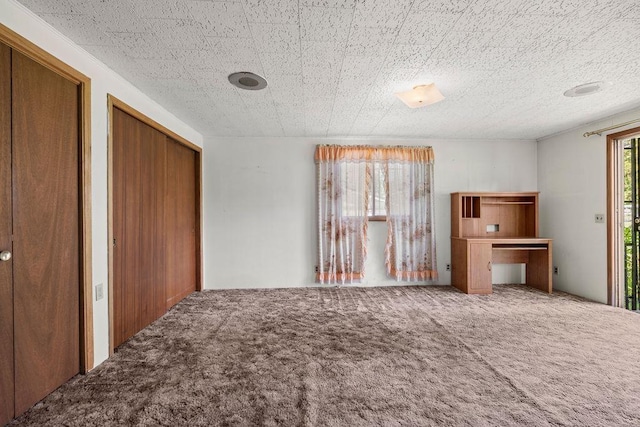 2920 N Regal St, Spokane, WA 99207 - unfurnished bedroom with carpet and multiple closets