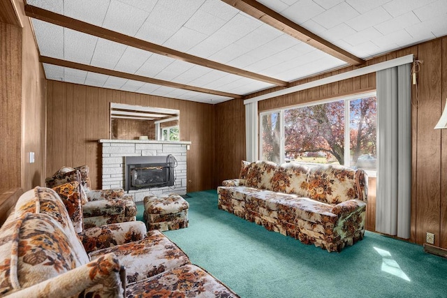 2920 N Regal St, Spokane, WA 99207 - living room with beamed ceiling, wooden walls, carpet flooring, and a fireplace
