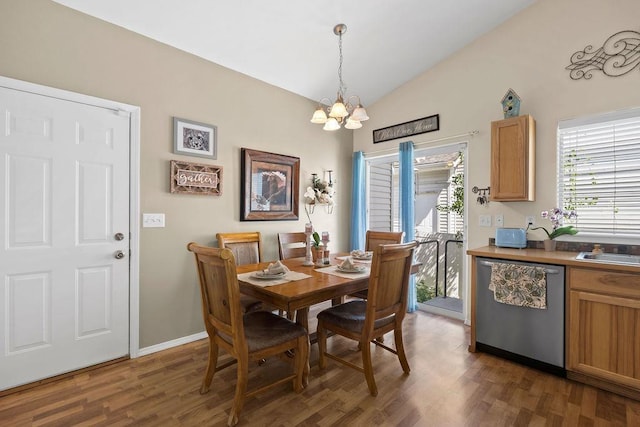 8910 N Oak St, Spokane, WA 99208 - dining room with a chandelier, lofted ceiling, and wood finished floors
