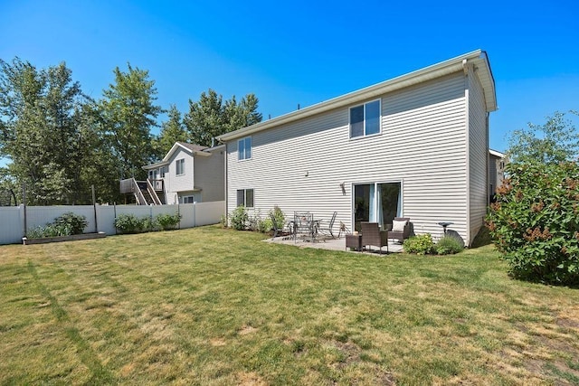 8910 N Oak St, Spokane, WA 99208 - rear view of house with a patio area
