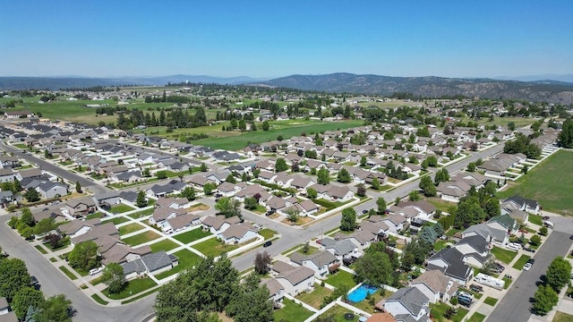 8910 N Oak St, Spokane, WA 99208 - aerial view of property and surrounding area featuring mountains and nearby suburban area
