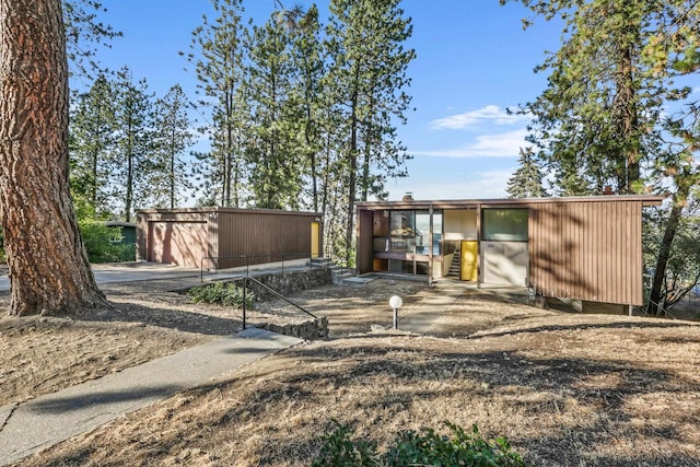 3717 E 17th Ave, Spokane, WA 99223 - rear view of house with an outdoor structure